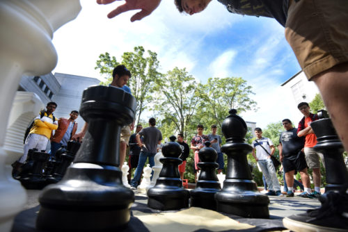 09/05/15 - BOSTON, MA. - Students participate in a giant game of chess during welcome week at Northeastern University on Sept. 5, 2016. Photo by: Matthew Modoono/Northeastern University