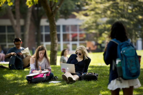 Students study during the first day of classes on Centennial Common on Wednesday. Photo by Adam Glanzman/Northeastern University