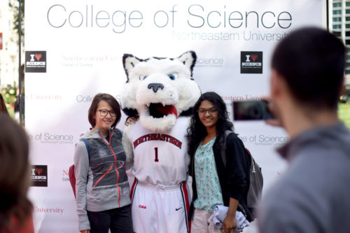 Students pose for photos with Paws during the College of Science I'm NU, You're NU event held on Krentzman Quad on Thursday. Photo by Matthew Modoono/Northeastern University