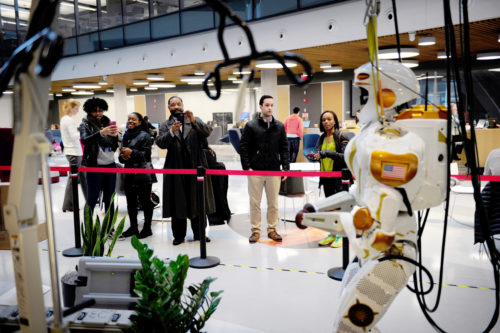 Students demonstrate NASA's humanoid robot prototype Valkyrie’s abilities in the atrium of the Interdisciplinary Science and Engineering Complex on Thursday. Photo by Matthew Modoono/Northeastern University