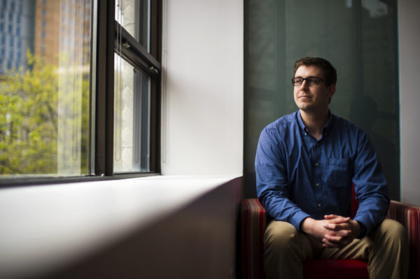 Max Spahn, S'17, is a Marine Corps veteran and now works full time at Northeastern's Center for the Advancement of Veterans and Servicemembers Photo by Adam Glanzman/Northeastern University