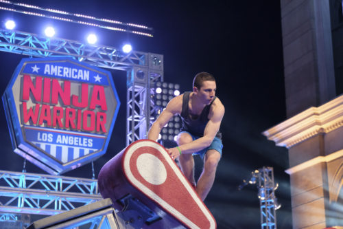 Josh Levin, E'17, competes in the Los Angeles finals course of American Ninja Warrior. <i>Photo by Tyler Golden/NBC</i>