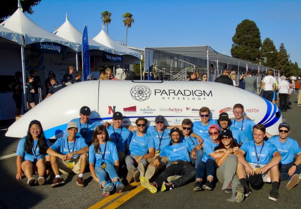 The Paradigm Hyperloop team poses with their pod. They plan to revise their design, making the pod smaller and faster. Photo courtesy of Luke Merkl.