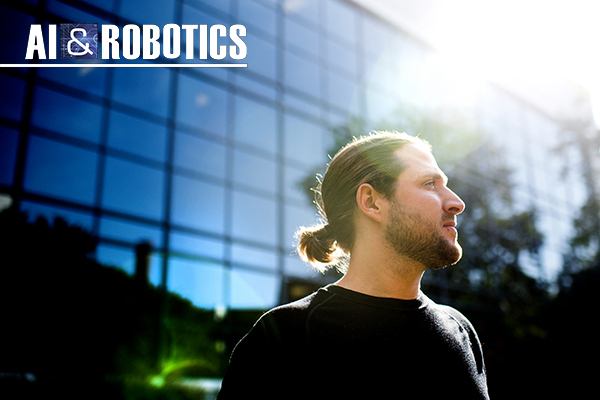 "AI and robotics have the potential to radically transform employment and displace a lot of workers," said John Basl, Assistant Professor of Philosophy. Basl's research focus on the ethical implications of new technologies. Photo by Matthew Modoono/Northeastern University