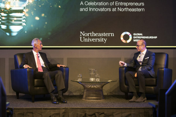 President Joseph E. Aoun, right, speaks with Amin Khoury, MBA'89, the inaugural recipient of the Distinguished Entrepreneur Award, on Tuesday night at the Interdisciplinary Science and Engineering Complex. Photo by Adam Glanzman/Northeastern University