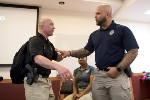 NUPD Officers John Sweeney, left, and Joe McCarthy participate in the Security Awareness Training event during the 2018 Preparedness Day held in the Curry Student Center on May 9, 2018. Photo by Matthew Modoono/Northeastern University
