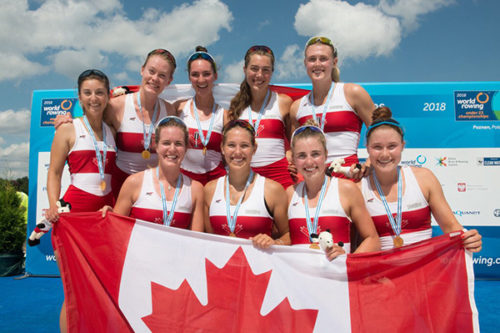 Madison Mailey, seen here on the far left of the first row, rowed for the second consecutive year on the Canadian team of eight with a coxswain. Photo courtesy of Northeastern Athletics.