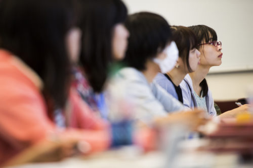 Students from Meiji University in Japan take classes at Northeastern University as part of an exchange program on August 10, 2018. Photo by Adam Glanzman/Northeastern University