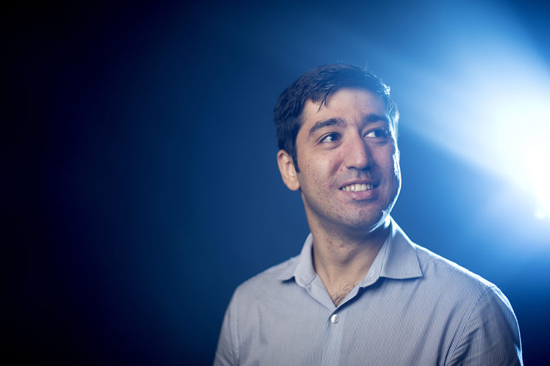 Alireza Ramezani, assistant professor of electrical and chemical engineering, created Bat Bot, which is an autonomous drone that can flap its wings, glide, make sharp turns, and swoop down. Photo by Matthew Modoono/Northeastern University