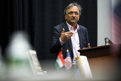 Ramachandra Guha talks about his book, Why Gandhi Matters, during a lecture in the Raytheon Amphitheater on October 18, 2018. Photo by Adam Glanzman/Northeastern University