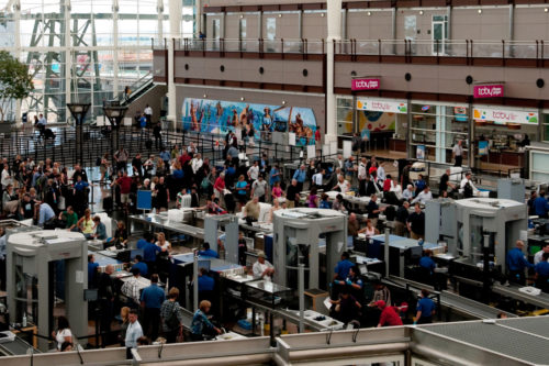 People traveling through security to the gates of Denver International Airport in the early morning of June 6, 2013. Photo by iStock.