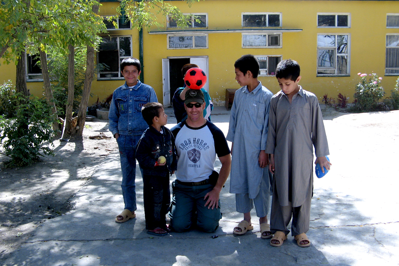 Phil McTigue visits the Kufa Orphanage in Kabul where in 2007 he and his wife delivered more than half a ton of supplies they had collected from family and friends including balls, games, musical instruments, winter accessories and quilts.