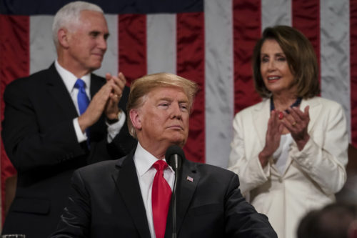 President Donald Trump gives his State of the Union address to a joint session of Congress on Tuesday, Feb. 5, 2019 at the Capitol in Washington, as Vice President Mike Pence, left, and House Speaker Nancy Pelosi look on. (Doug Mills/The New York Times via AP, Pool)