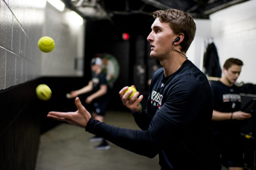 A player works on his hand-eye coordination before the Beanpot final. Photo by Matthew Modoono/Northeastern University