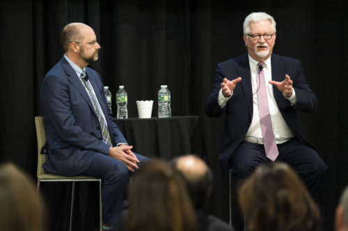 Faculty and staff across Northeastern’s global network joined Chancellor Ken Henderson, left, and Provost James C. Bean, right, in conversations to discuss the university’s reorganization this month.  Photo by Adam Glanzman/Northeastern University