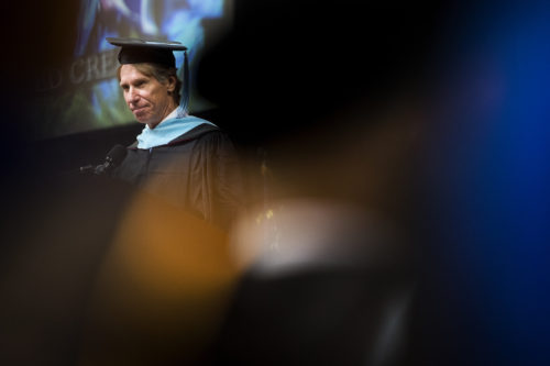 Billy Starr, who founded the Pan-Mass Challenge, urged graduates of the College of Professional Studies at Northeastern to find a way to nurture their own most fervent interests in life. Photo by Adam Glanzman/Northeastern University