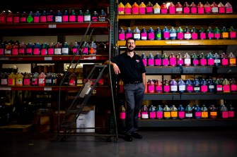 “I never knew I was gonna end up in a label business,” says Ryan Dunlevy, a Northeastern graduate who started working for his family’s custom label company following a brief stint in the technology field. Photo by Matthew Modoono/Northeastern University