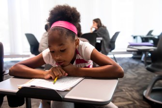 Word Detectives is helping more than 20 elementary school children from Greater Boston improve their literacy skills with intensive phonics lessons and reading workshops this summer. Photo by Ruby Wallau/Northeastern University