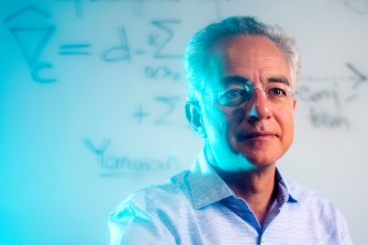 As mathematics professor Valerio Toledano Laredo will tell you, symmetry is more complicated than you might think. But the theory that underlies it might make the world a little simpler to understand. Photo by Matthew Modoono/Northeastern University