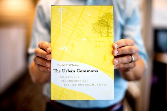 Boston’s 311 reporting system is the subject of O’Brien’s latest book, The Urban Commons: How Data and Technology Can Rebuild Our Communities. Photo by Matthew Modoono/Northeastern University