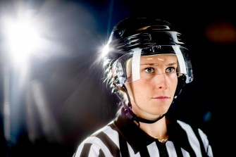 Northeastern graduate Kelly Cooke became one of the first women to referee an NHL preseason event. Will she be working in the NHL itself someday? Photo by Matthew Modoono/Northeastern University