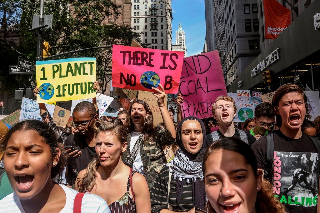 Climate change activists participate in an environmental demonstration as part of a global youth-led day of action, Friday Sept. 20, 2019, in New York. A wave of climate change protests swept across the globe Friday, with hundreds of thousands of young people sending a message to leaders headed for a U.N. summit: The warming world can't wait for action. (AP Photo/Bebeto Matthews)