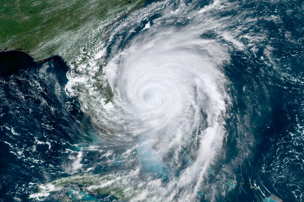 This satellite image, taken on Tuesday, Sept. 3, 2019 and provided by National Oceanic and Atmospheric Administration, shows Hurricane Dorian moving off the east coast of Florida in the Atlantic Ocean. NOAA via AP