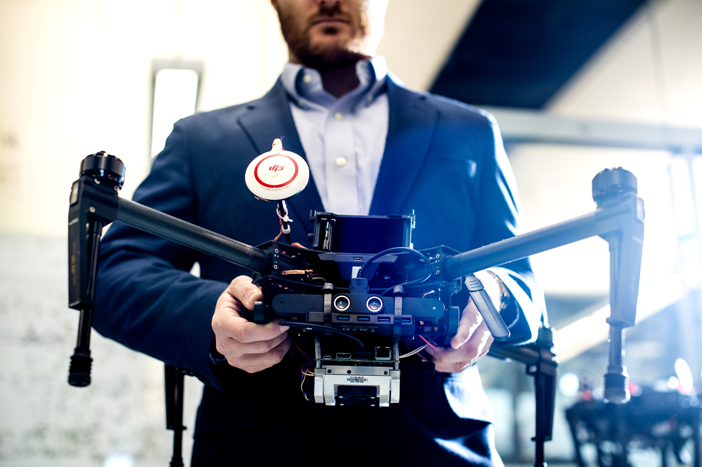 Haner poses with a drone