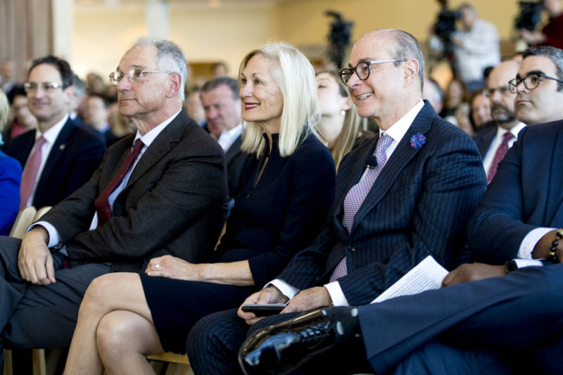 Joseph E. Aoun, president of Northeastern (right), joined with David and Barbara Roux, the visionaries behind the Roux Institute at Northeastern, on Monday at an opening presentation in Portland, Maine. Photo by Matthew Modoono/Northeastern University