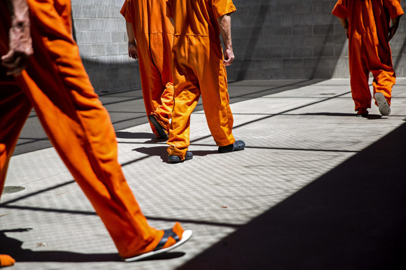 In this Friday, July 13, 2018, photo, inmates walk the yard during recreation time at the Twin Falls County Jail in Twin Falls, Idaho. Growth in Twin Falls County, and the state of Idaho as a whole, doesn’t show signs of slowing anytime soon. As the population continues to increase, crowding in local and statewide jails and prisons will become an even more urgent issue. (Pat Sutphin/The Times-News via AP)