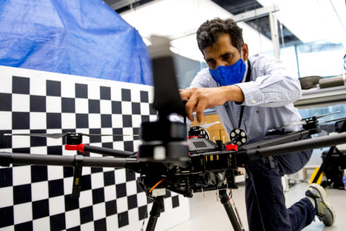 Hanumant Singh,
Professor of Electrical and Computer Engineering, works on a drone in the ISEC building on Sept. 28, 2020. Photo by Matthew Modoono/Northeastern University