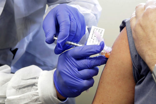 Supporters of Joe Biden and Dr. Anthony Fauci were significantly more likely to get vaccinated than backers of President Donald Trump, researchers from Northeastern, Harvard, Northwestern, and Rutgers found. AP Photo by Ted S. Warren