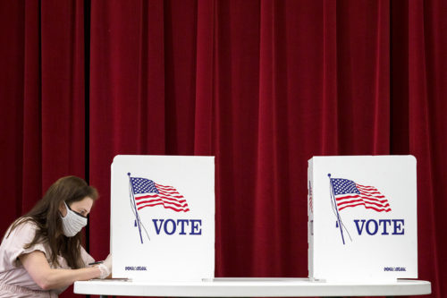 Elizabeth Snow fills out her ballot at Red Bank Cumberland Presbyterian Church on Aug. 6, 2020, in Red Bank, Tenn. AP Photo by C.B. Schmelter/Chattanooga Times Free Press