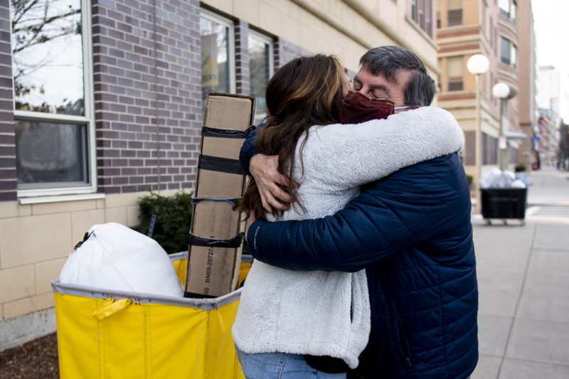 Jacki Smith, a first-year Northeastern student, hugs her father Gary Smith goodbye after moving into her dormitory on Columbus Avenue. Photo by Ruby Wallau/Northeastern University