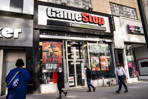 Pedestrians pass a GameStop store on 14th Street at Union Square, on Jan. 28, 2021, in the Manhattan borough of New York. AP Photo by John Minchillo