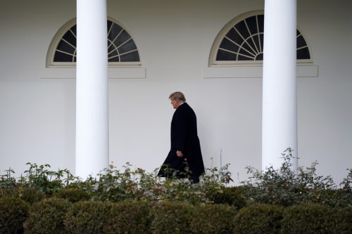President Donald Trump walks to the White House on Dec. 31, 2020, in Washington. AP Photo by Evan Vucci