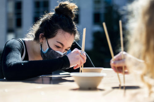 Cynthia El Choueiri, who studies economics and international affairs, participates in Ultimate Chopstick Warrior hosted by the Office of Global Services and the Society of Asian Scientists and Engineers at Krentzman Quad. Photo by Ruby Wallau/Northeastern University