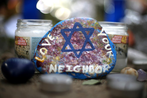 A painted rock found as part of a makeshift memorial outside the Tree of Life Synagogue in the Squirrel Hill neighborhood of Pittsburgh, in honor of the people killed during worship services. AP Photo by Gene J. Puskar