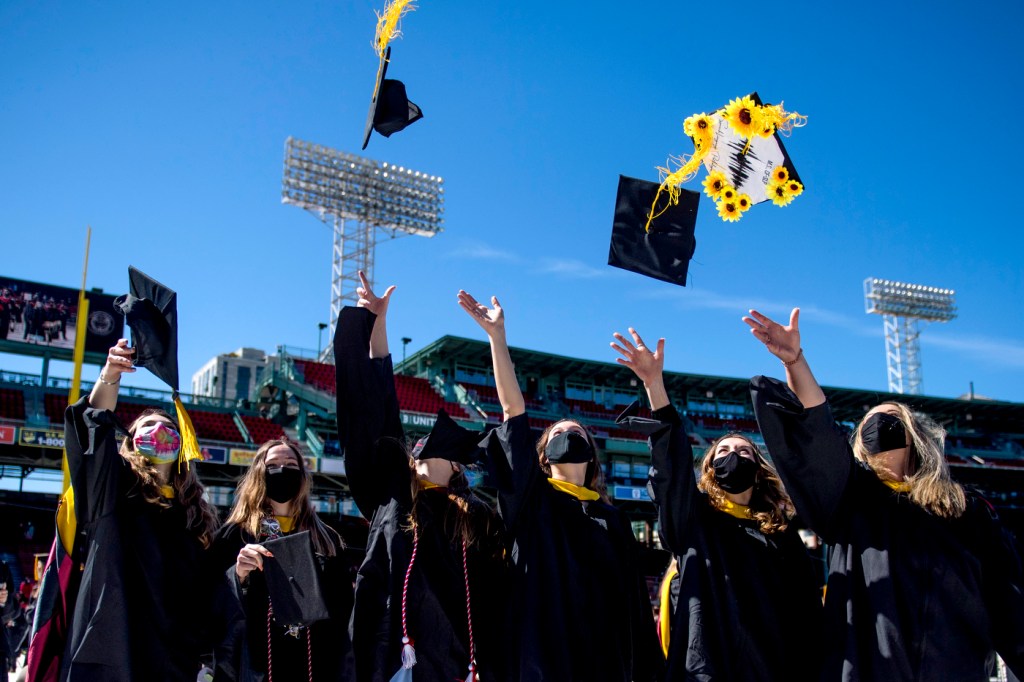 Northeastern graduate students celebrated Commencement Sunday from the field of Fenway Park in Boston.