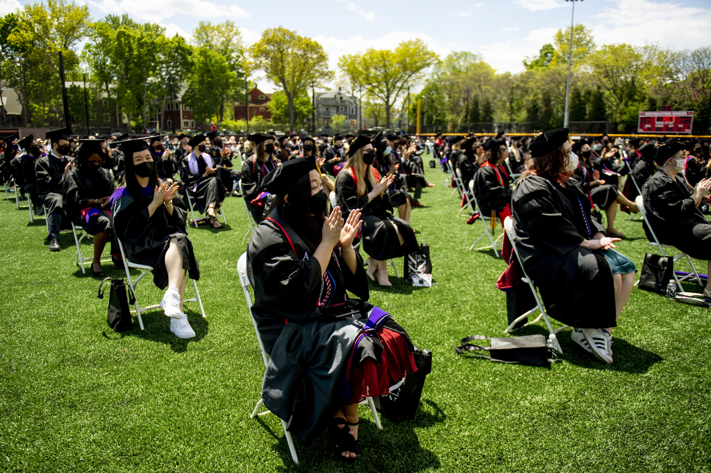 School of Law graduates seated at Parsons Field in Brookline during their 2021 Commencement