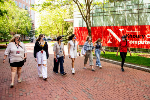 A Northeastern student leads an in-person tour on campus.
