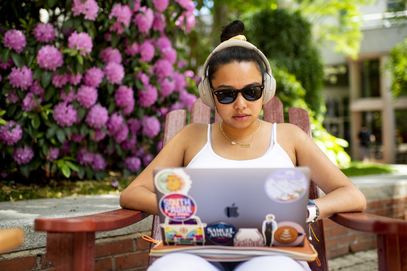 Denise Seno, who is a graduate student in physical therapy, studies on Snell Quad. Photo by Ruby Wallau/Northeastern University