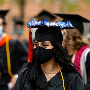 Graduating senior in her cap and gown.