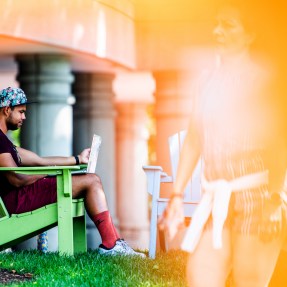 A student reads on the Northeastern campus.