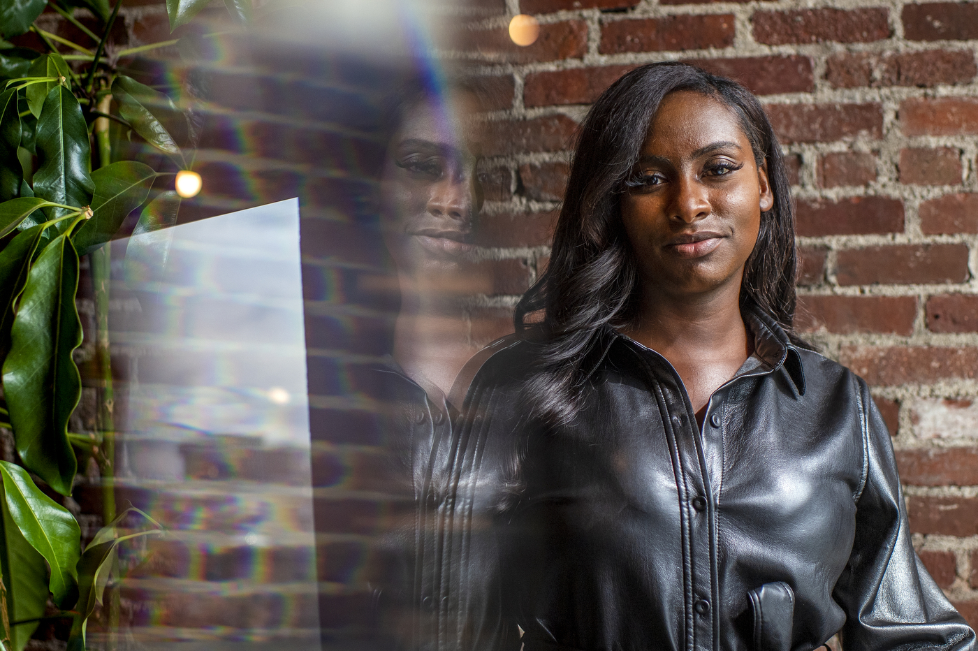 Northeastern graduate Camille Martin poses for a portrait at The Engine in Cambridge, Mass.