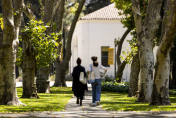 Students stroll on the Mills College campus. Photo by Ruby Wallau for Mills College