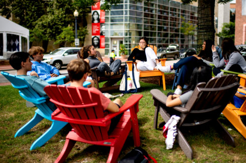 Incoming students have a conversation on Centennial Common. Photo by Matthew Modoono/Northeastern University