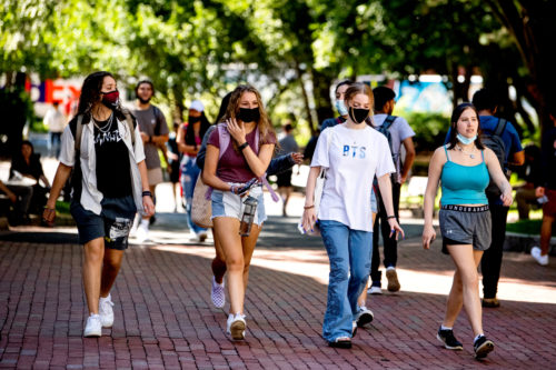 Students walk though campus for the start of the Fall semester. Photo by Matthew Modoono/Northeastern University