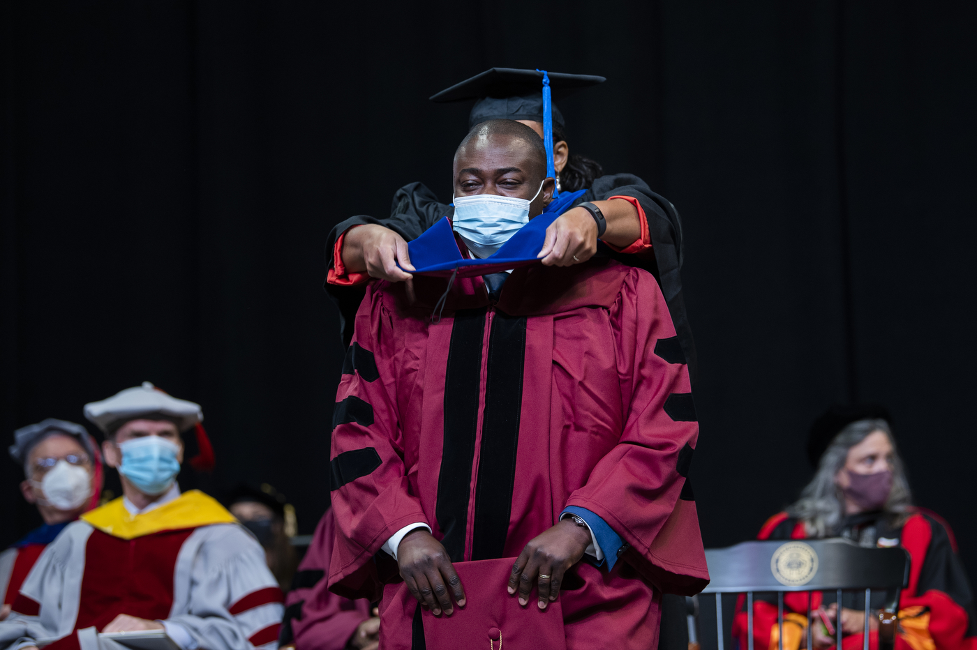northeastern doctoral graduate receives hood