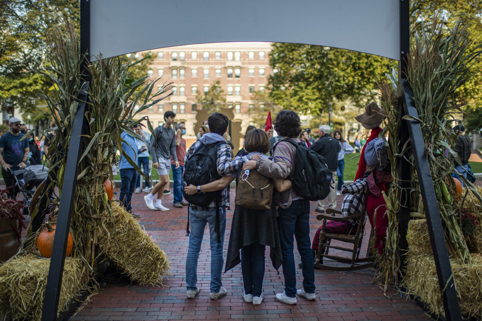 10/22/21 - BOSTON, MA. - Family members pose for photographs with students before a tour of the Northeastern arboretum on Friday, Oct. 22, 2021 . Photo by Alyssa Stone/Northeastern University